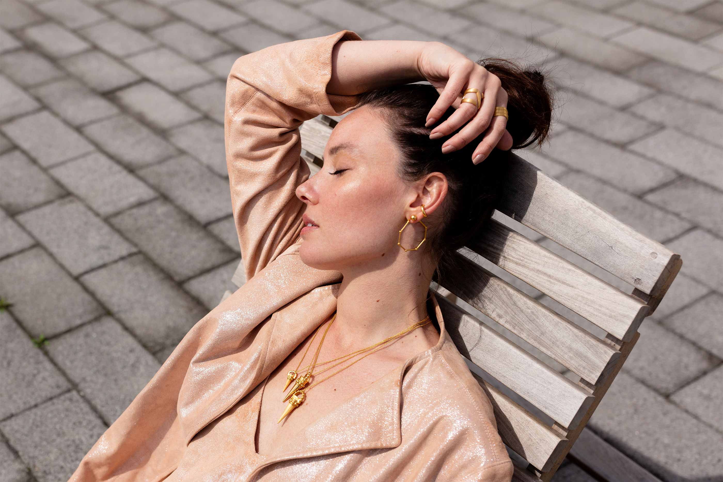 Alyson Eastman is wearing Auvere 22 and 24 karat gold jewelry