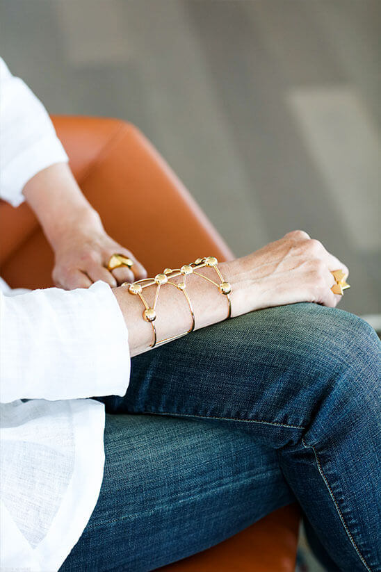 Alyson Redman wearing Auvere 22 and 24 karat gold jewelry