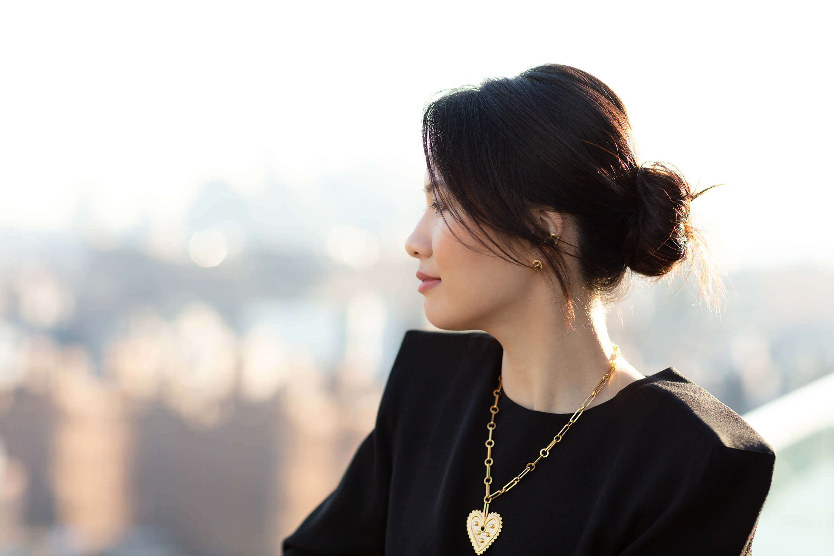 Chloe Cai is wearing Auvere 22 and 24 karat gold jewelry