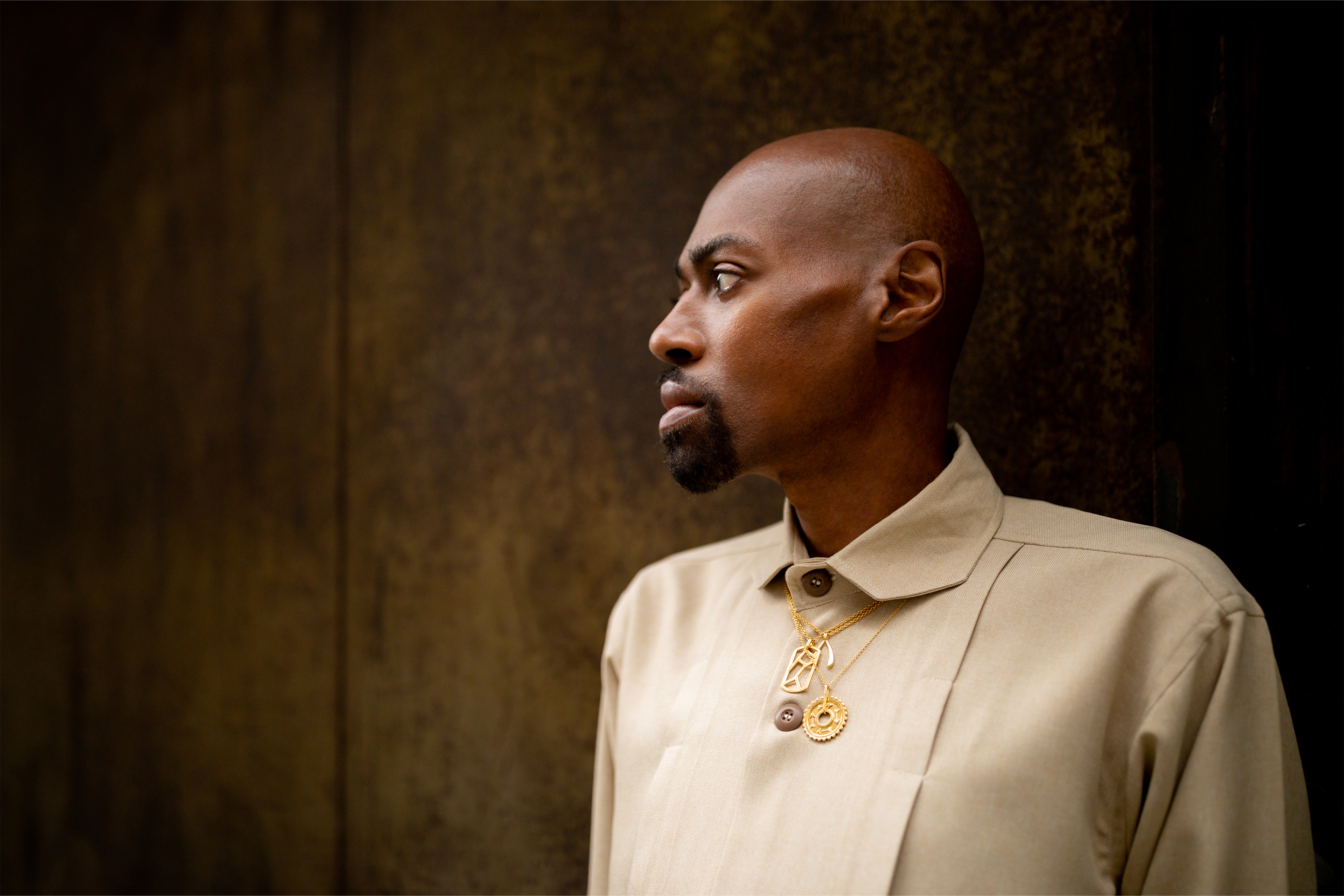 Henry Edwards II is wearing Auvere 22 and 24 karat gold jewelry