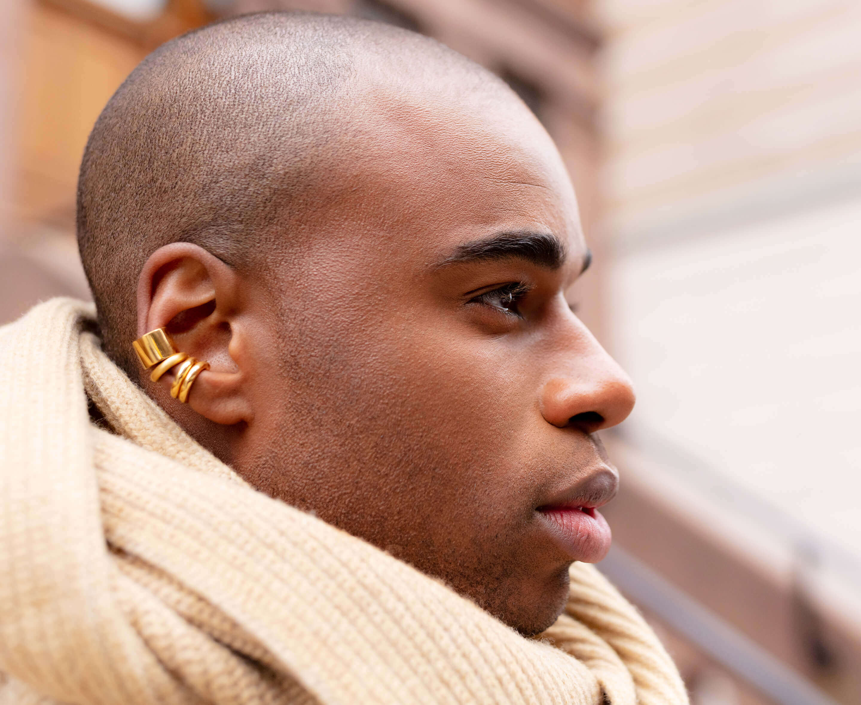 Marcus Stewart is wearing Auvere 22 and 24 karat gold jewelry