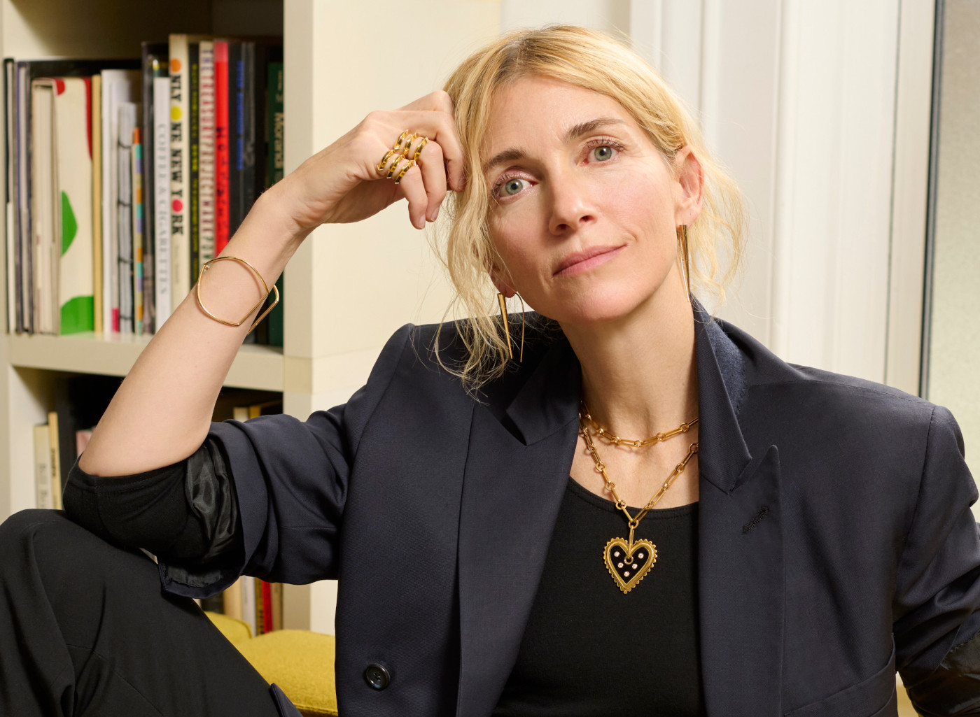 Molly Findlay wearing Auvere gold jewelry in the office