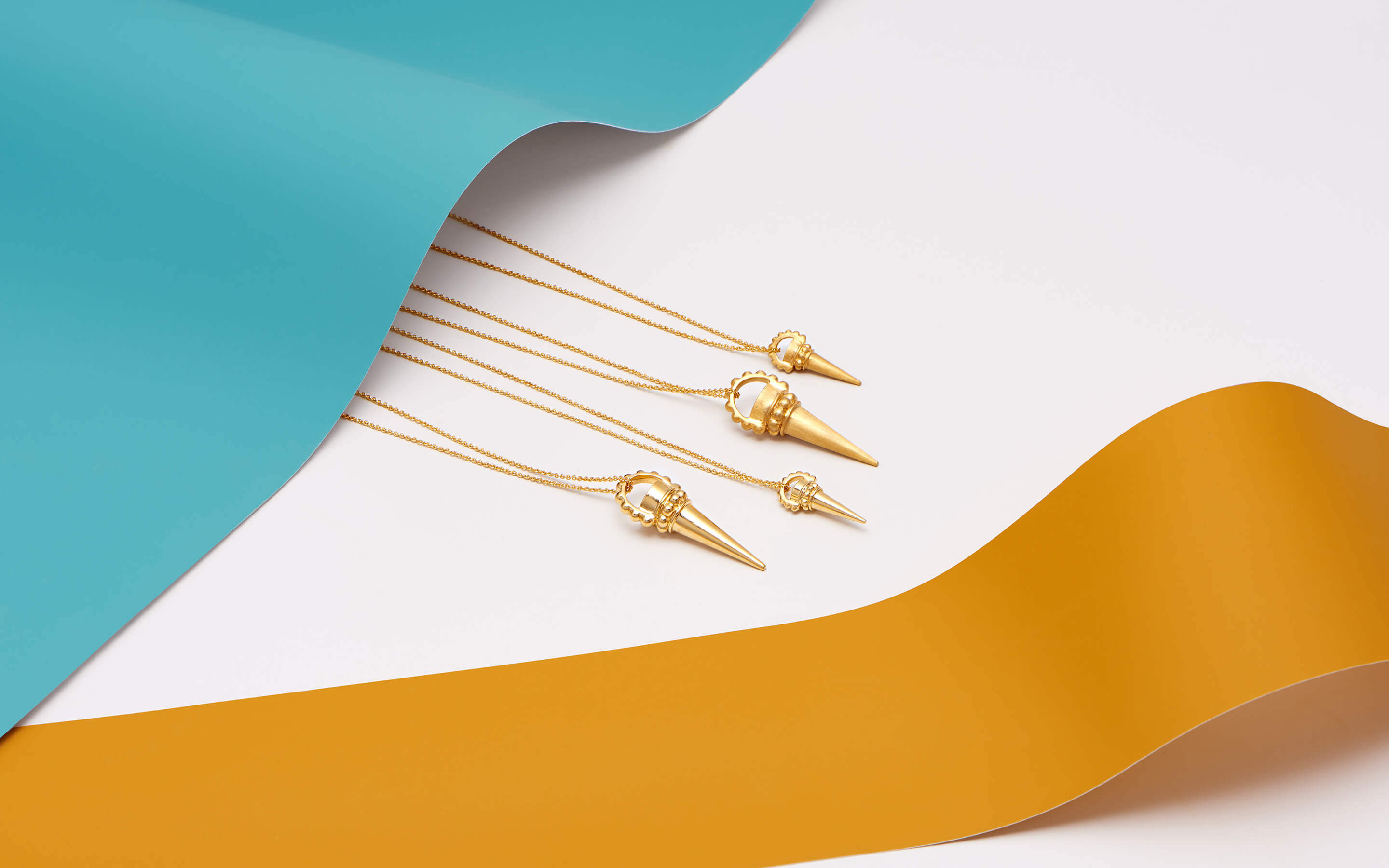 Auvere 22 and 24 karat gold jewelry from the Gold Play campaign