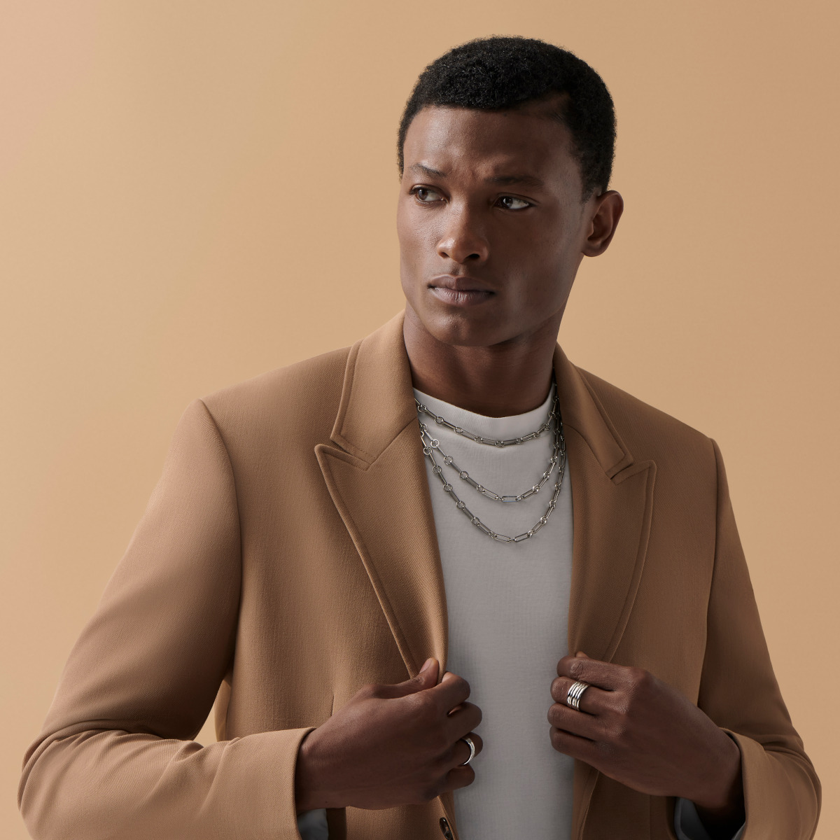 Model wearing sterling silver chain necklaces for the Father's Day Gift Guide