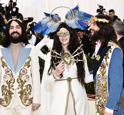 Alessandro Michele of Gucci, Lana Del Rey & Jared Leto, all in Gucci looks embroidered in gold bullion with gold accessories.